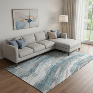 HomeRoots 10' X 14' Teal Peach Ivory Washable Area Rug - Modern Abstract Design with UV Protection & Durability 696812