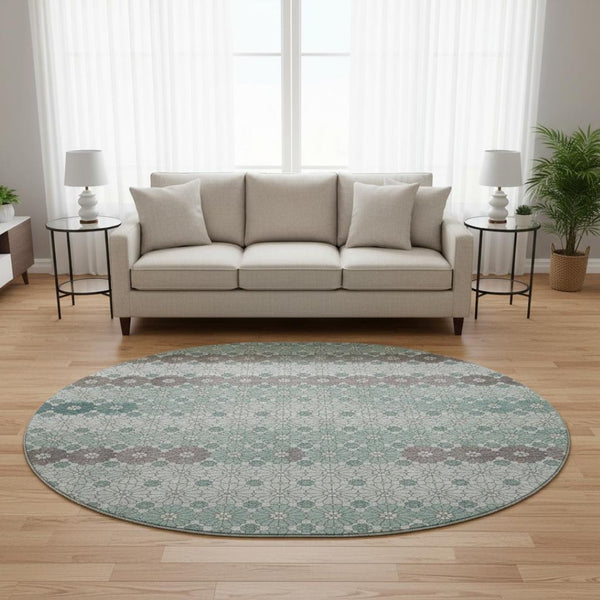 HomeRoots 8' Teal Gray & Silver Geometric Washable Round Rug - Durable, UV Protected & Stylish for Any Room 696887
