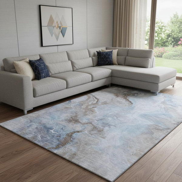 HomeRoots 8' X 10' Abstract Blue, Taupe & Beige Washable Area Rug with UV Protection for Family-Friendly Spaces 697023