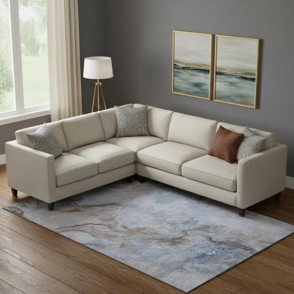HomeRoots 10' X 14' Abstract Washable Area Rug in Blue Taupe & Beige – Durable, UV Protected & Stain Resistant! 697025