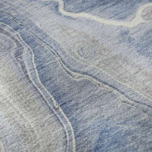 HomeRoots 8' Denim Blue Gray and Ivory Abstract Washable Round Rug - Durable, UV Protected for Modern Spaces 697040