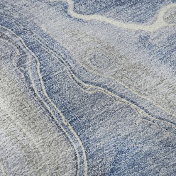 HomeRoots 8' Denim Blue Gray and Ivory Abstract Washable Round Rug - Durable, UV Protected for Modern Spaces 697040