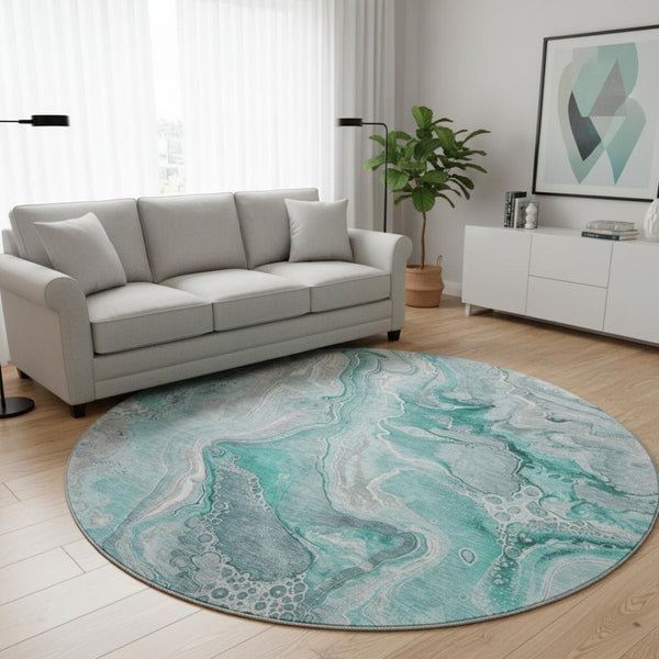 HomeRoots 8' Teal Gray and Ivory Abstract Washable Round Rug with UV Protection for Family-Friendly Spaces 697058