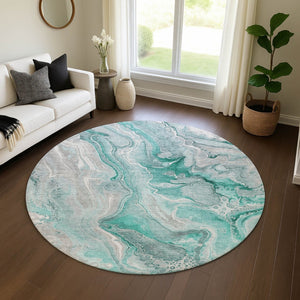 HomeRoots 8' Teal Gray and Ivory Abstract Washable Round Rug with UV Protection for Family-Friendly Spaces 697058