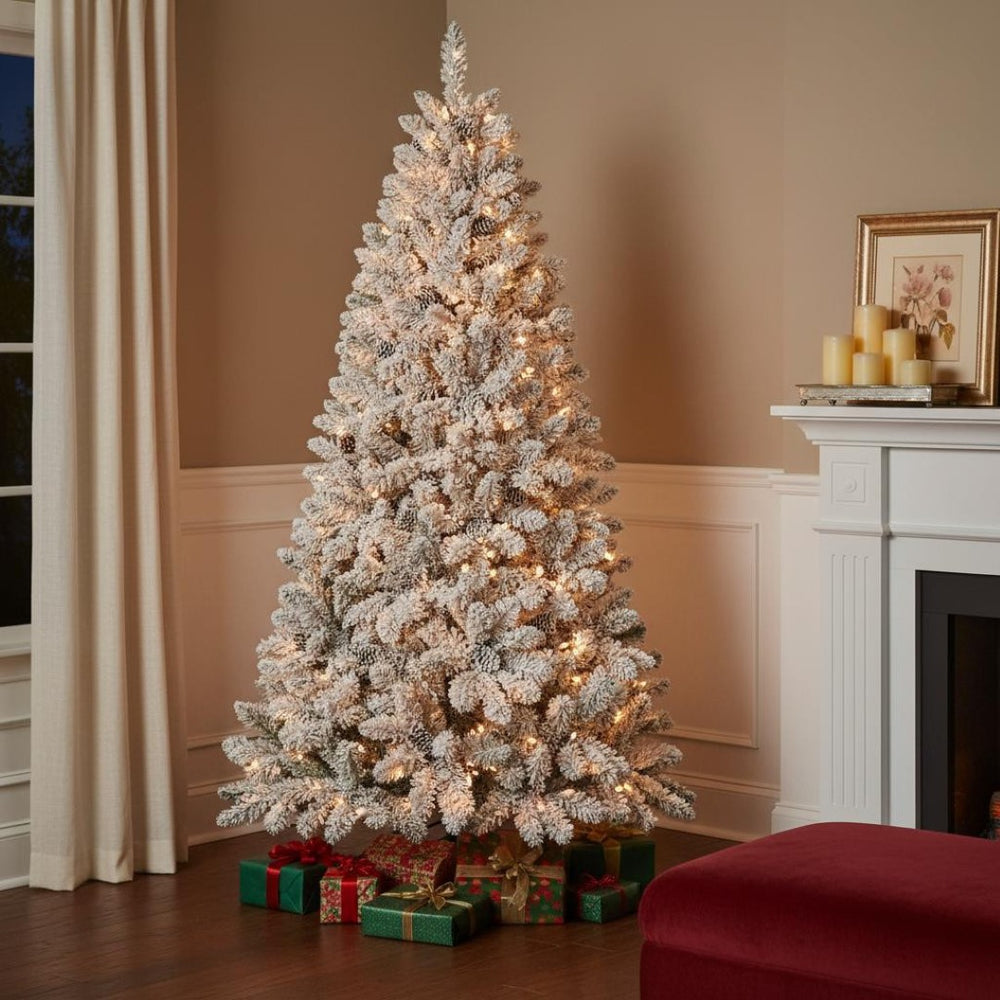 HomeRoots 8' Pre-Lit Flocked Spruce Christmas Tree - Realistic, Snowy Look with 700 Lights & Pinecones Included! 697062