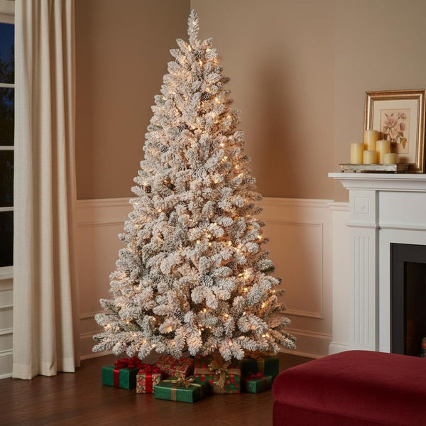 HomeRoots 8' Pre-Lit Flocked Spruce Christmas Tree - Realistic, Snowy Look with 700 Lights & Pinecones Included! 697062