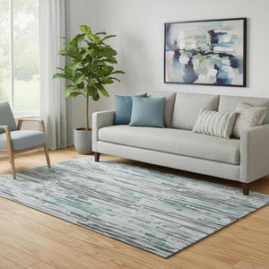 HomeRoots 5' X 8' Stylish Teal Gray Silver Striped Area Rug - Washable, UV Protected, Perfect for High Traffic Homes 697142
