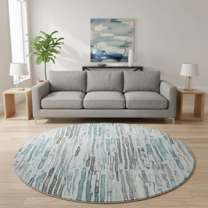 HomeRoots 8' Teal Gray & Silver Striped Washable Round Rug - UV Protected, Durable & Stylish for Any Space 697143