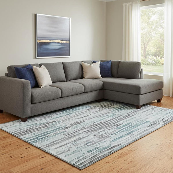 HomeRoots 8' X 10' Stylish Teal Gray Silver Striped Area Rug - Washable, UV Protected, Non-Slip Backing 697144