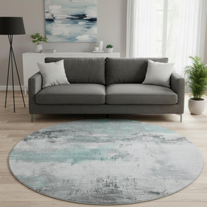 HomeRoots 8' Teal Gray Ivory Abstract Washable Round Rug - Durable, UV Protected, Perfect for Modern Spaces! 697185
