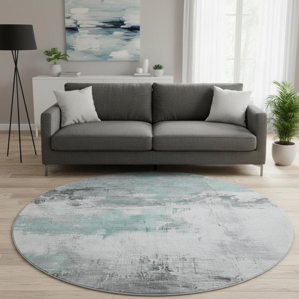 HomeRoots 8' Teal Gray Ivory Abstract Washable Round Rug - Durable, UV Protected, Perfect for Modern Spaces! 697185