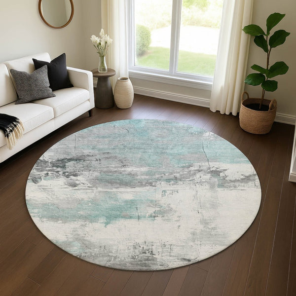 HomeRoots 8' Teal Gray Ivory Abstract Washable Round Rug - Durable, UV Protected, Perfect for Modern Spaces! 697185