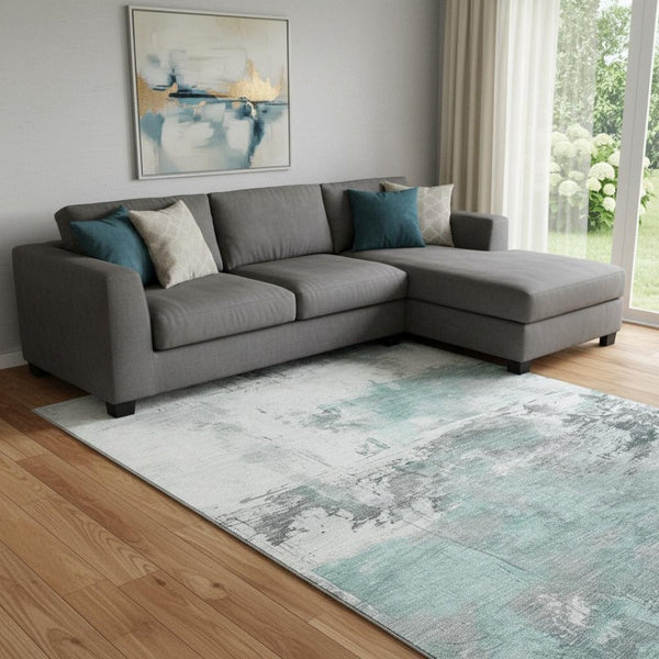 HomeRoots 8' X 10' Teal Gray Ivory Abstract Area Rug - Washable, UV Resistant, Durable for Family Spaces 697186