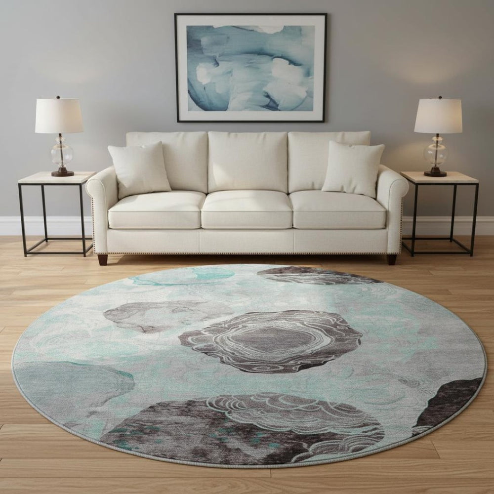 HomeRoots 8' Teal Charcoal and Ivory Geometric Round Rug - Washable, UV-Protected, Stylish for Any Space 697209