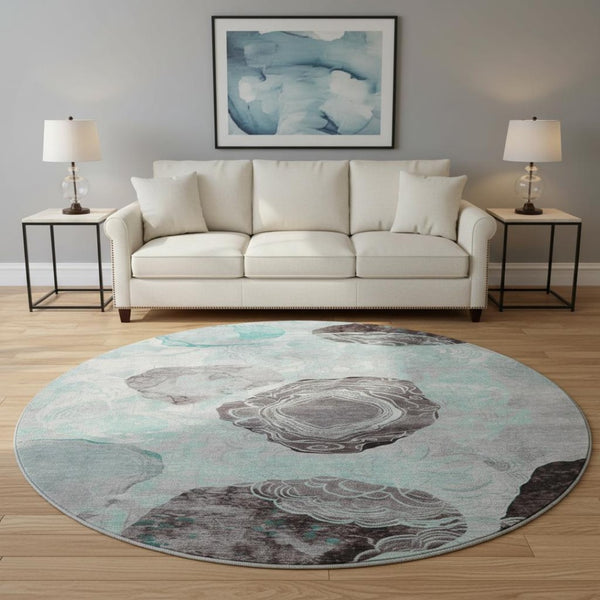 HomeRoots 8' Teal Charcoal and Ivory Geometric Round Rug - Washable, UV-Protected, Stylish for Any Space 697209
