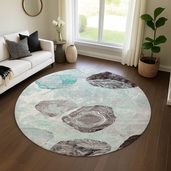 HomeRoots 8' Teal Charcoal and Ivory Geometric Round Rug - Washable, UV-Protected, Stylish for Any Space 697209