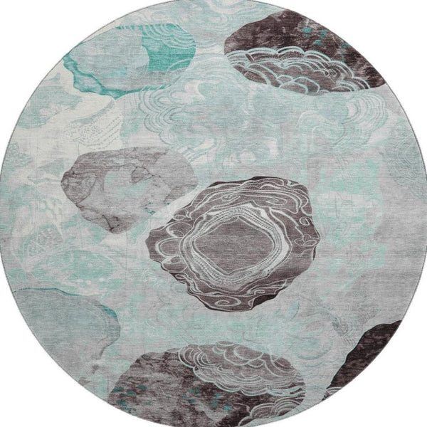 HomeRoots 8' Teal Charcoal and Ivory Geometric Round Rug - Washable, UV-Protected, Stylish for Any Space 697209