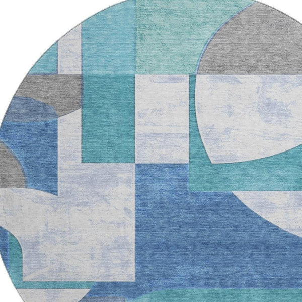 HomeRoots 8' Teal Ivory Gray Abstract Round Rug - Washable, Stain Resistant, UV Protected for Modern Spaces 697371