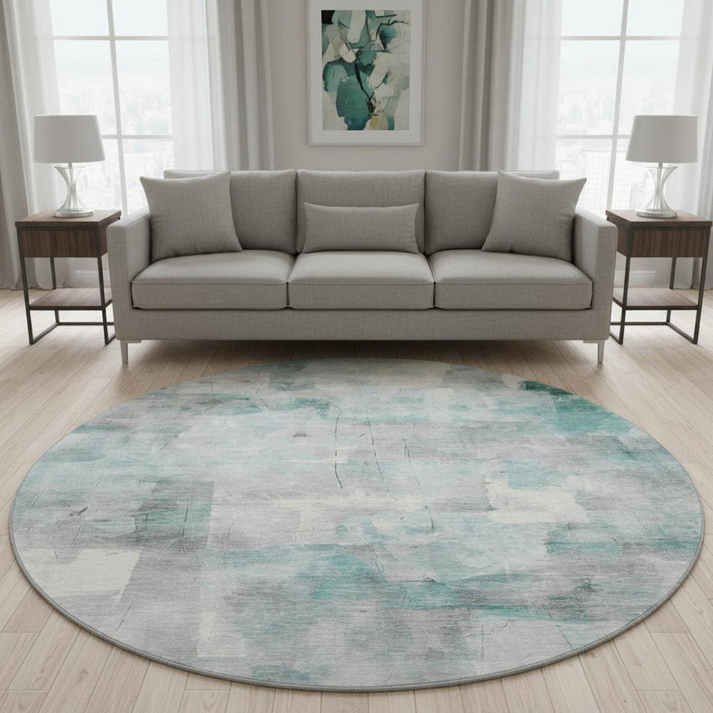 HomeRoots 8' Teal Gray and Silver Abstract Washable Round Rug with Stain Resistance and UV Protection Features 697527