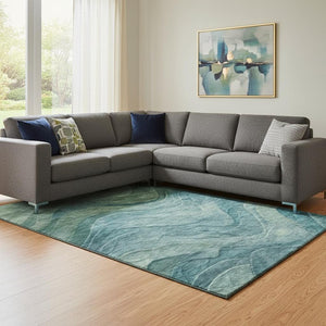 HomeRoots 8' X 10' Teal and Green Abstract Area Rug - Washable, UV-Protected, Durable for High-Traffic Homes 697612