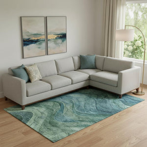 HomeRoots 9' X 12' Teal and Green Abstract Area Rug - Washable, UV Protected, Ideal for High-Traffic Homes 697613