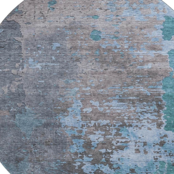 HomeRoots 8' Teal Taupe and Blue Abstract Washable Round Rug - Durable, UV-Protected for High-Traffic Spaces 697671