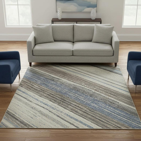 HomeRoots 8' Denim Blue, Ivory & Gray Striped Round Rug - Washable, UV-Protected for Indoor & Outdoor Use! 697689