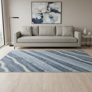 HomeRoots 8' Blue Ivory and Gray Striped Washable Round Rug - Durable, UV Protected, Ideal for Family Spaces 697701