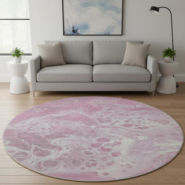 HomeRoots 8' Pink And Ivory Abstract Washable Round Rug – Durable, UV-Protected, Ideal for Modern Spaces! 697743