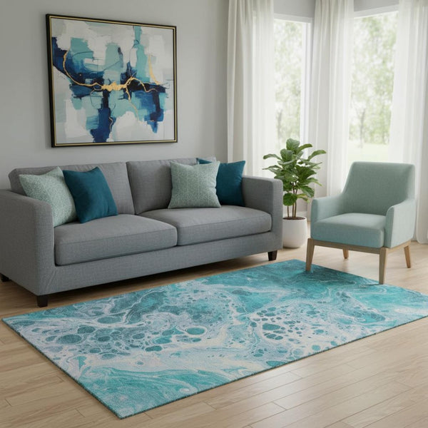 HomeRoots 5' X 8' Teal and Ivory Abstract Area Rug - Washable, UV Protected, Non-Slip Backing for Durability! 697754