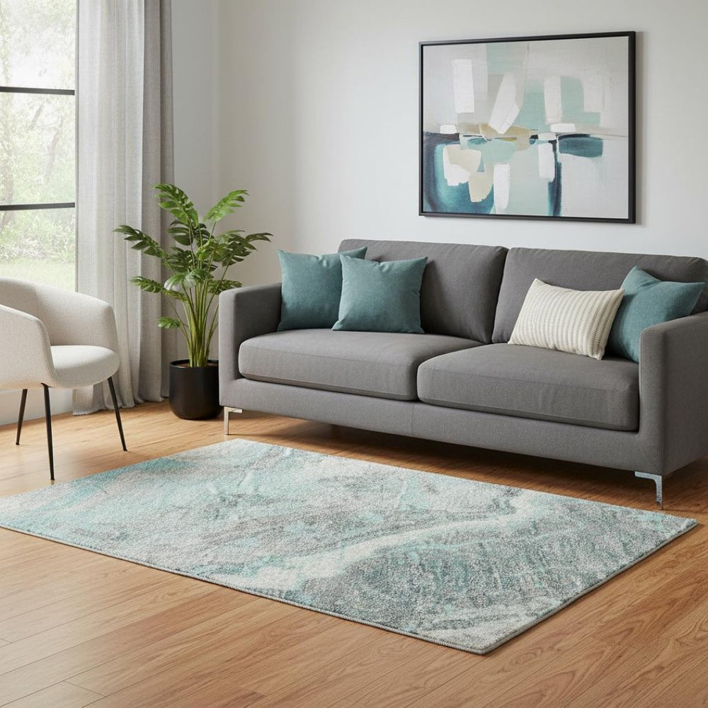 HomeRoots 5' X 8' Teal Gray Silver Abstract Area Rug - Washable, UV Protected, Durable, Modern Design for Homes 697868