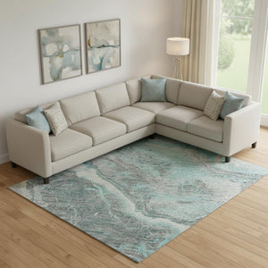 HomeRoots 9' X 12' Abstract Teal Gray Silver Washable Area Rug with UV Protection for Modern Living Spaces 697871