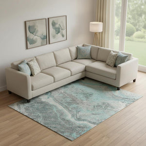 HomeRoots 10' X 14' Stylish Teal Gray Silver Abstract Washable Area Rug with UV Protection & Stain Resistance 697872