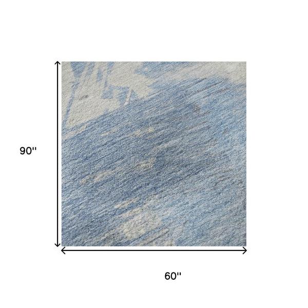 HomeRoots 5' X 8' Washable Denim Blue, Ivory & Beige Abstract Area Rug - Durable, UV Protected & Pet-Friendly! 697892