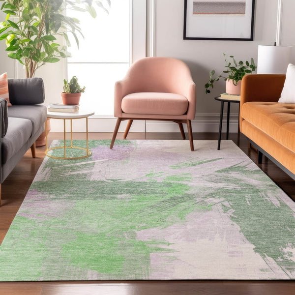 HomeRoots 10' X 14' Abstract Area Rug in Green, Lavender & Ivory - Washable, UV Protected & Stain Resistant! 697902