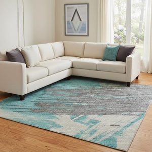HomeRoots 8' X 10' Teal Beige Ivory Abstract Area Rug - Washable, UV Protected, Durable for Active Homes 697924