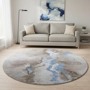HomeRoots 8' Stylish Taupe Blue Ivory Abstract Round Rug - Washable, UV-Protected, Durable for High Traffic Areas 697959