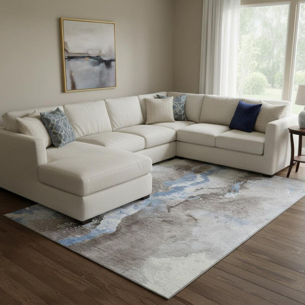 HomeRoots 8' X 10' Modern Abstract Washable Area Rug in Taupe, Blue & Ivory - UV Protection & Stain Resistant 697960