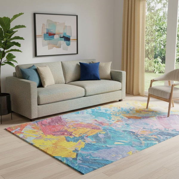 HomeRoots 5' X 8' Vibrant Abstract Area Rug in Blue, Yellow & Pink – Washable, UV Protected, Non-Slip Design 697964