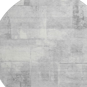 HomeRoots 8' Geometric Round Rug in Gray Silver & Ivory - Washable, UV Protected, Perfect for High Traffic Areas! 698001