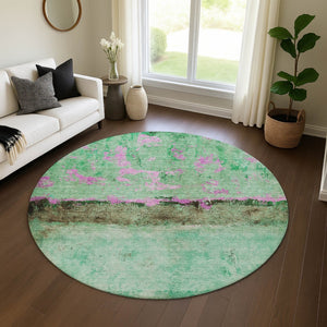 HomeRoots 8' Vibrant Abstract Round Rug in Green, Teal, and Pink – Washable, UV-Protected for Modern Spaces 698050