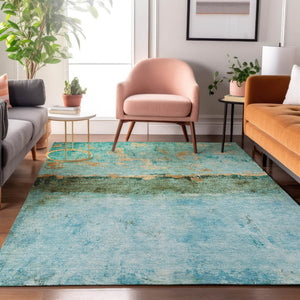 HomeRoots 10' X 14' Teal, Gold, & Olive Green Abstract Area Rug - Washable, UV Protected, & Stain Resistant! 698077
