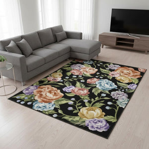 HomeRoots 6' Bold Floral Washable Area Rug in Black, Green & Orange – Stain-Resistant, Non-Slip, Durable Design 6' X 9' 698917