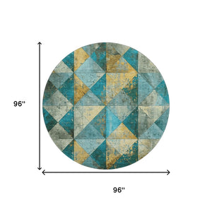 HomeRoots 8' Teal, Gold & Ivory Geometric Round Rug - Washable, UV-Protected, Stain Resistant for Family Homes 699103