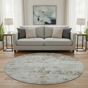 HomeRoots 8' Beige and Ivory Abstract Round Rug - Washable, UV Protected, Stain Resistant for Family Spaces 699133