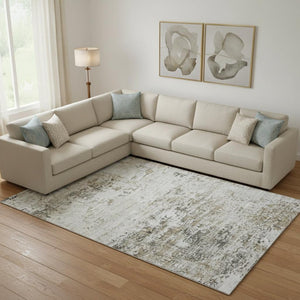 HomeRoots 9' X 12' Abstract Beige and Ivory Area Rug - Washable, UV Protected, Stain Resistant for Busy Homes 699135