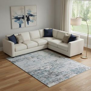 HomeRoots 9' X 12' Stylish Sky Blue Abstract Area Rug - Washable, UV-Protected, Ideal for Busy Homes & Pets 699171