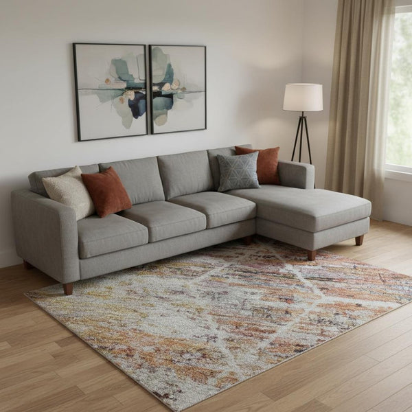 HomeRoots 9' X 12' Geometric Washable Area Rug in Pink, Peach & Ivory - UV Protected, Pet-Friendly Style! 699201