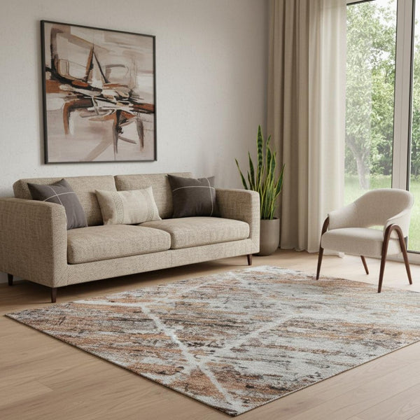 HomeRoots 5' X 8' Modern Rust Copper and Ivory Geometric Washable Area Rug with UV Protection for Homes 699204