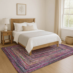 HomeRoots 5' X 8' Washable Geometric Area Rug in Vibrant Pink, Blue, and Orange with UV Protection Features 699246